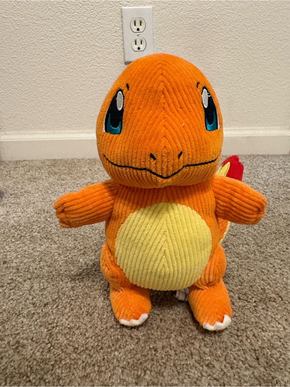 Pokemon Orange Charmander Plush with Yellow Belly and Blue Eyes